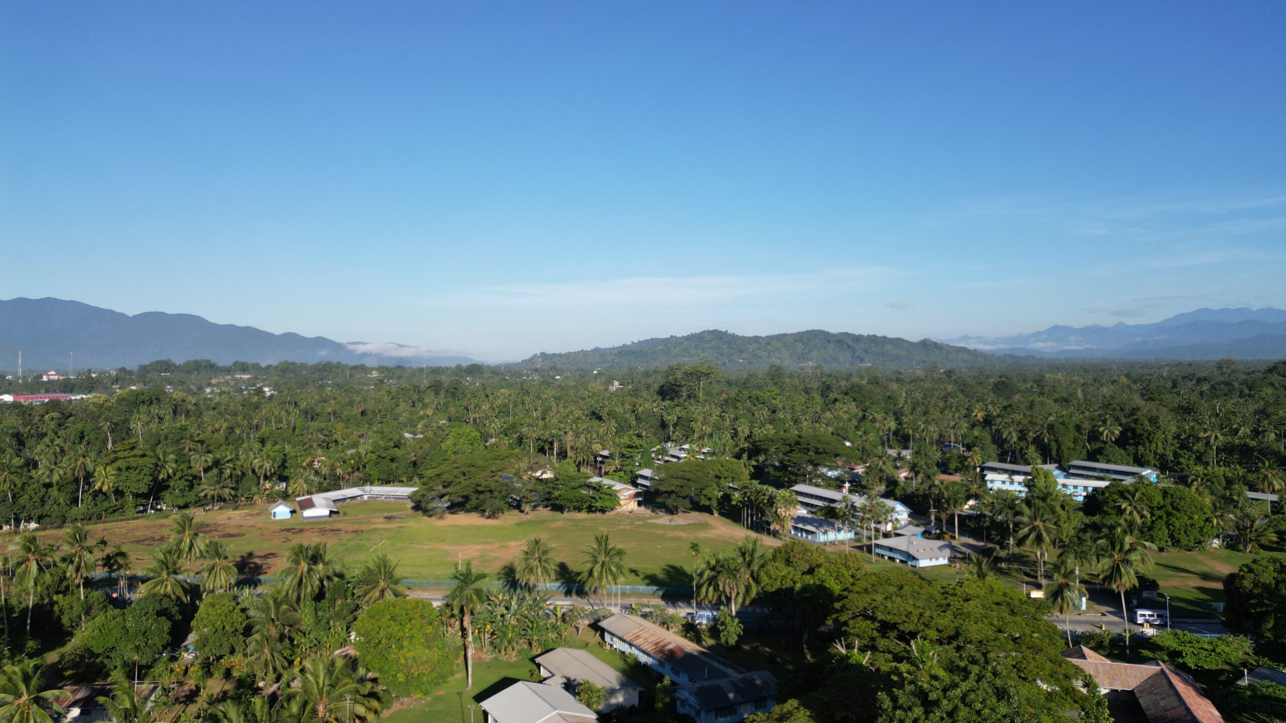 aerial view over a school compound in the highlands of Papua New Guinea